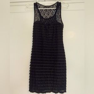 Size small black fitted dress with lace features